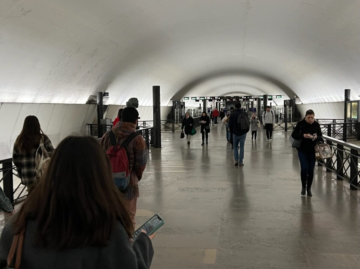 Walking through the Rato Metro Station 