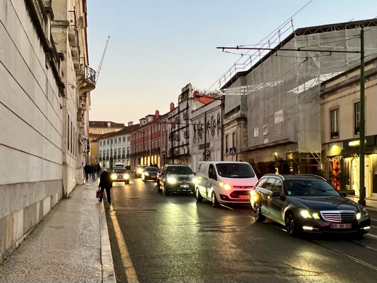 Cars lined up on the busy Rue da Escola Politécnica in Lisbon