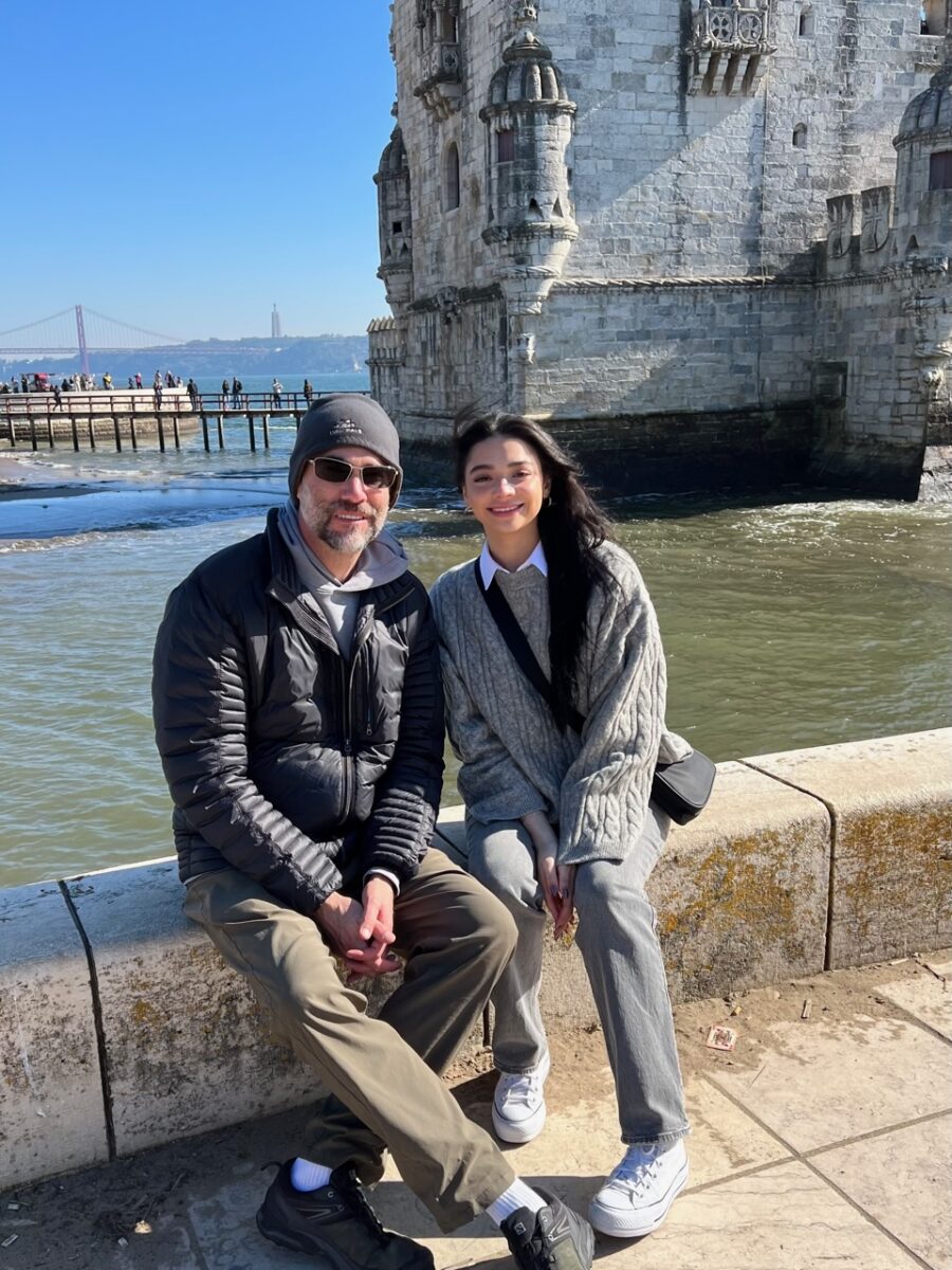 The Thorough Tripper dressed warmly at the Belém Tower in Lisbon in early February
