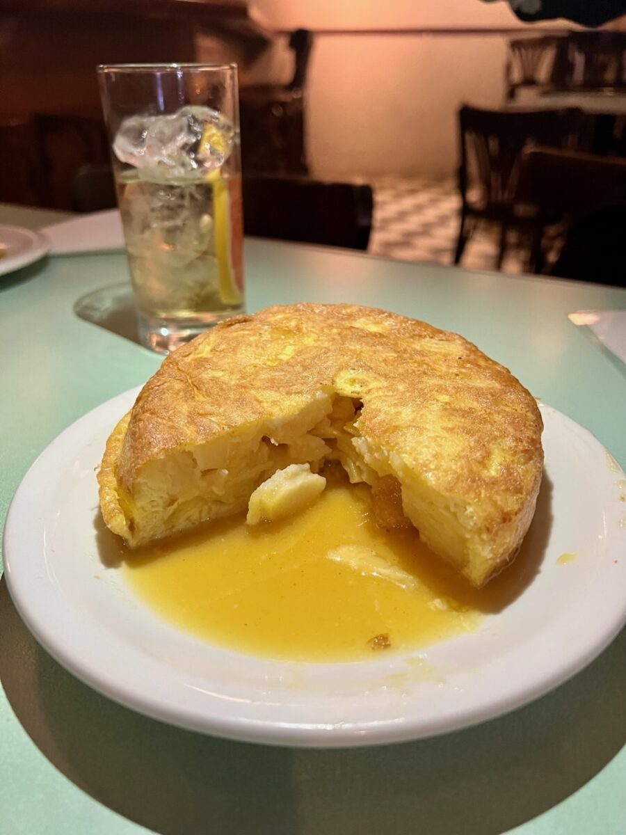 A Spanish Tortilla and a glass of Vermouth at La Fuerza in Buenos Aires Argentina