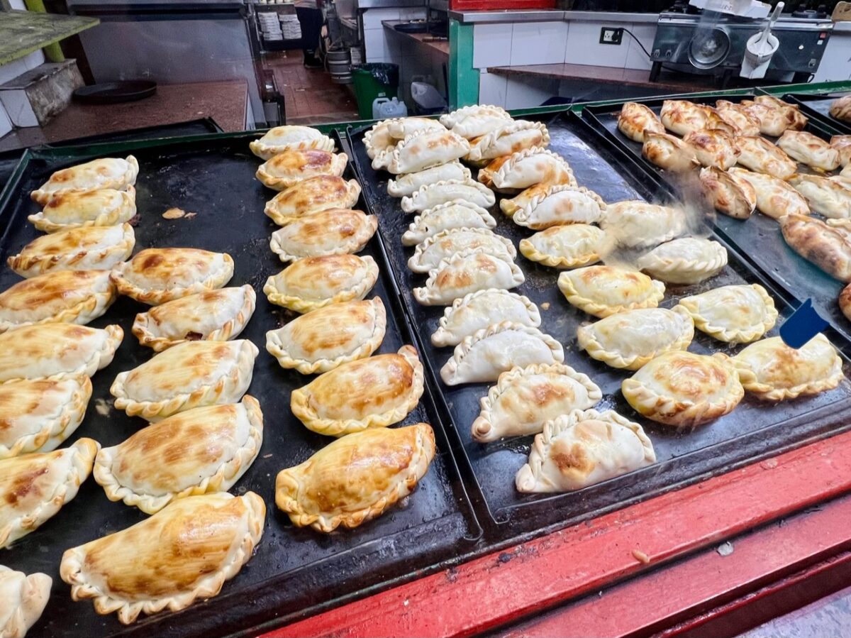 A window display of empanadas