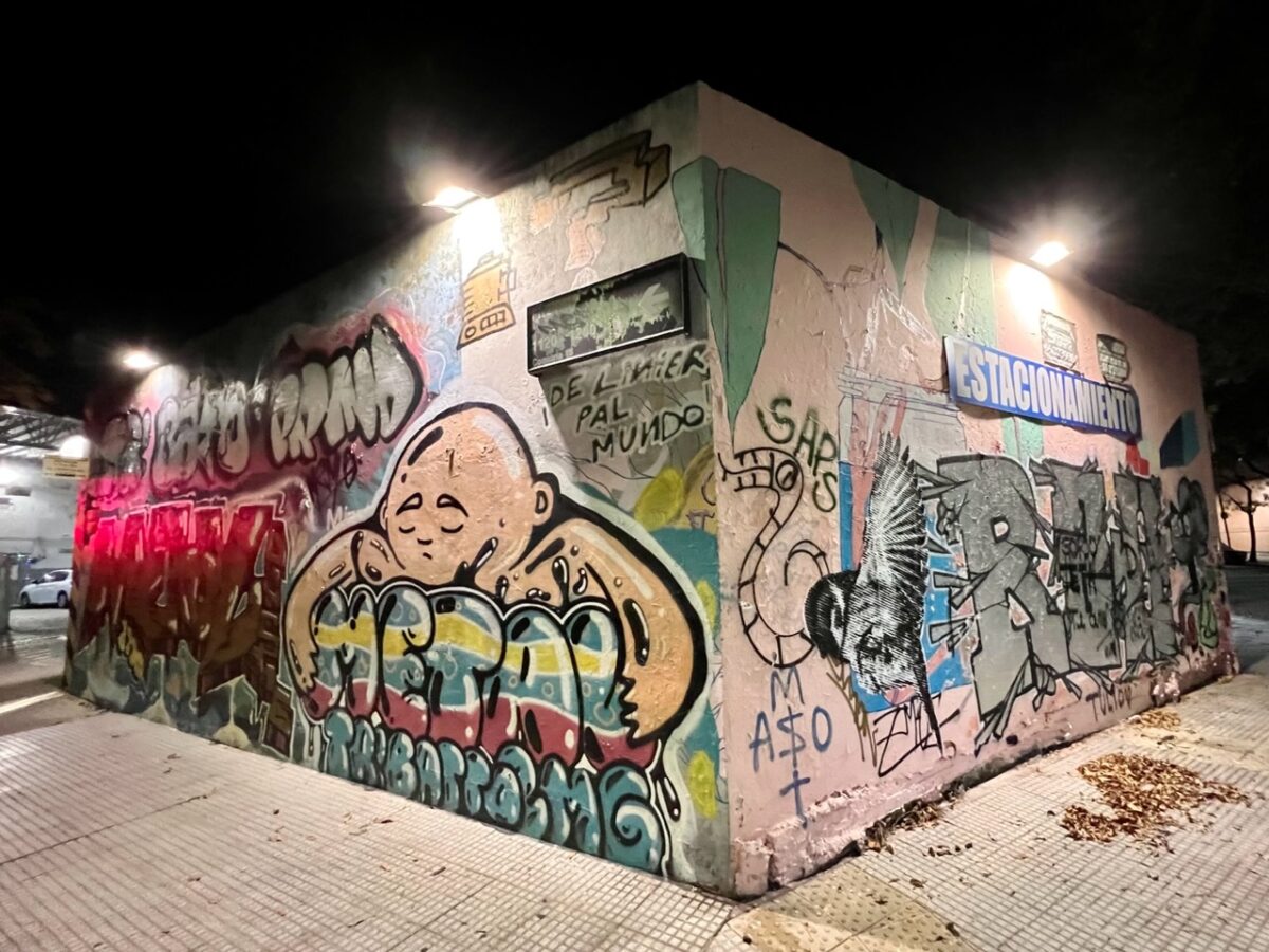 A building covered with graffiti and street art in the Chacarita neighborhood of Buenos Aires