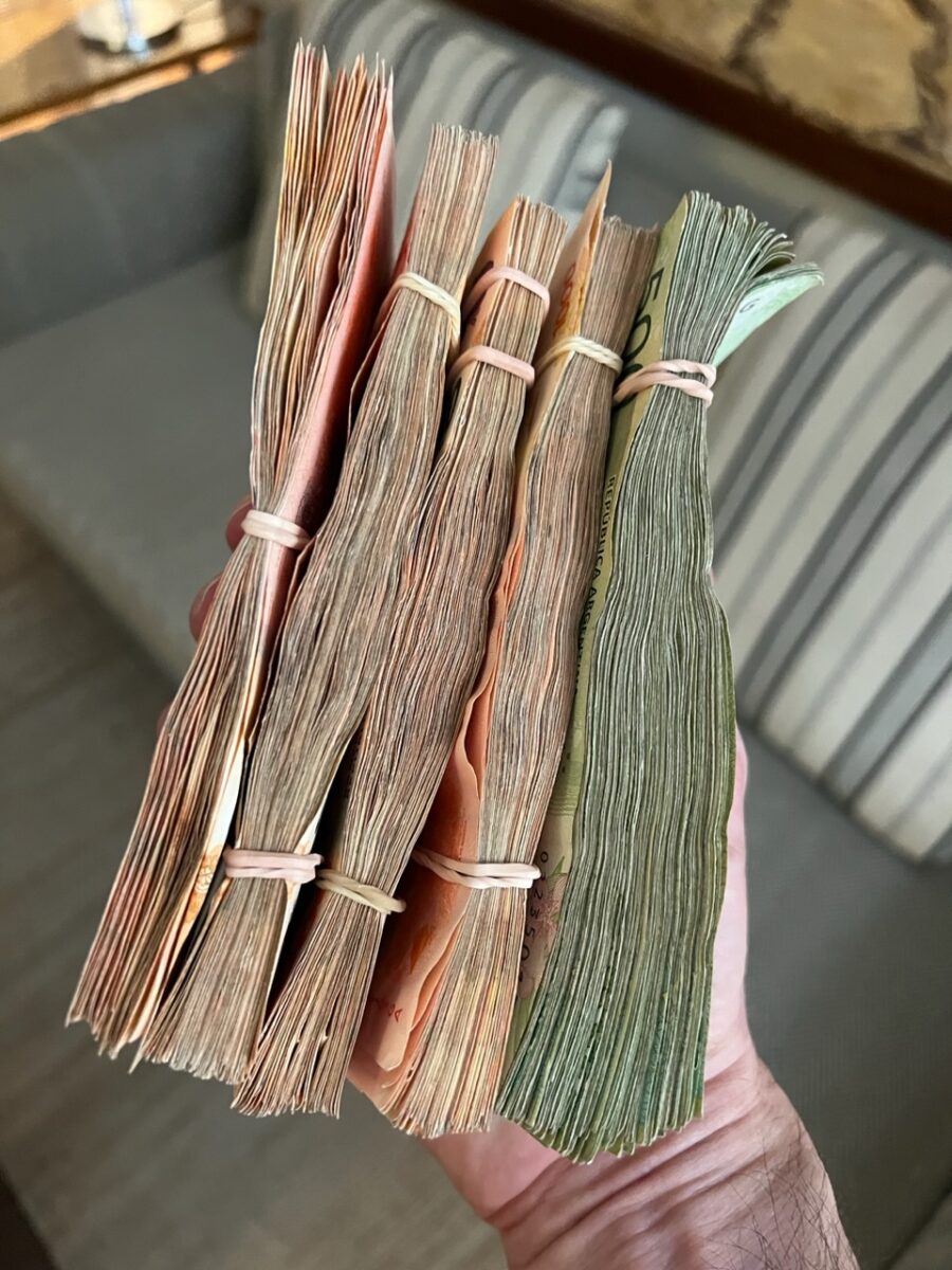 A handful of Argentine Pesos after exchanging for USD at a Cave in Buenos Aires