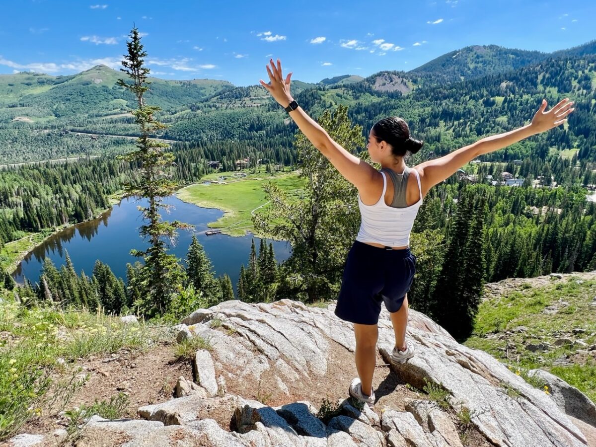 A hiker looks down on Silver Lake in Big Cottonwood Canyon near Salt Lake City