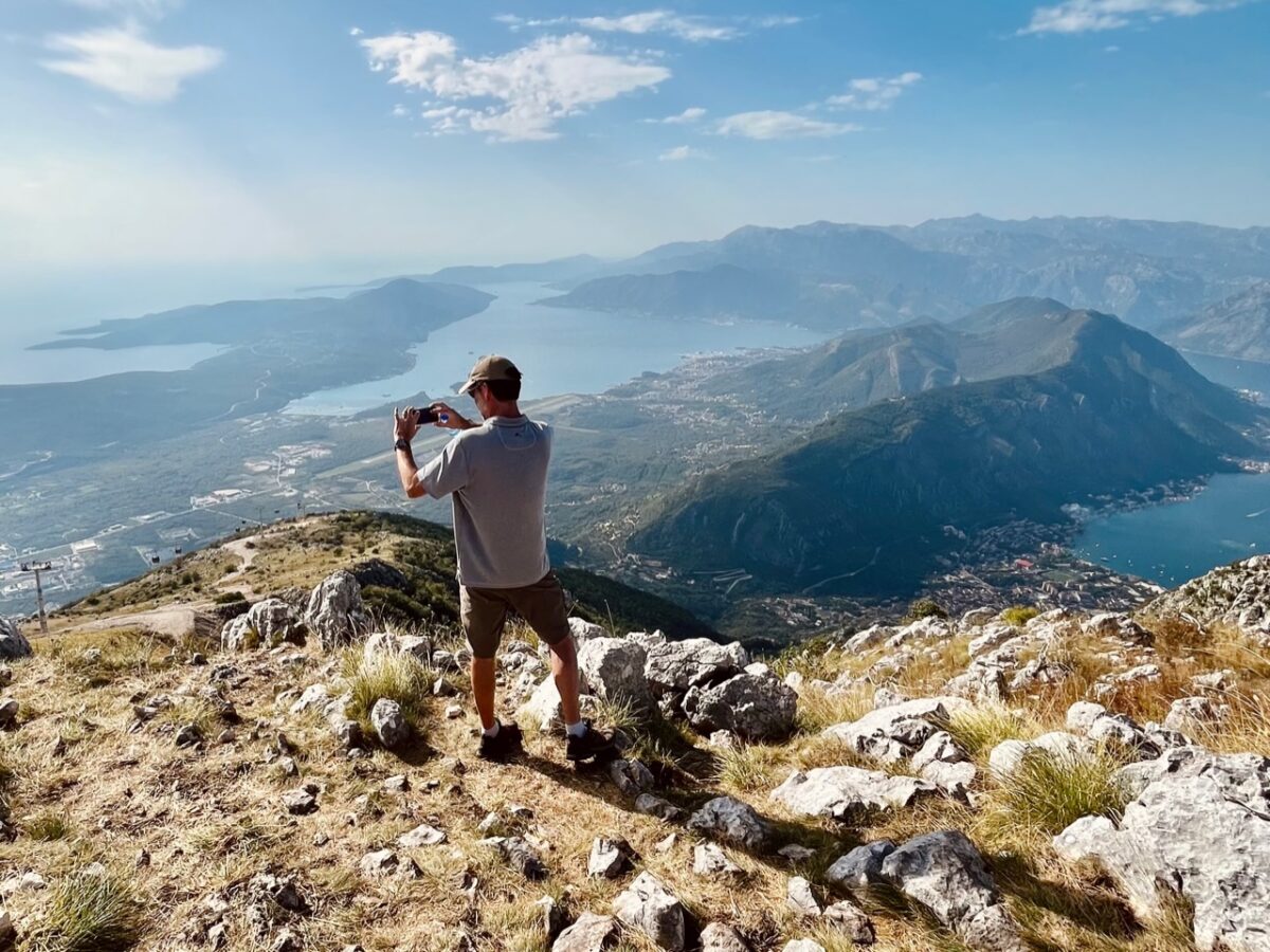 The Thorough Tripper takes photos of the Aegean Sea and the Bay of Kotor from Mount Lovćen 