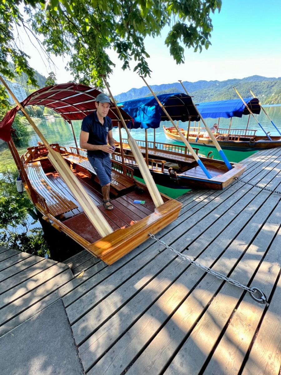 Traditional Pletna boats line up on Lake Bled in Slovenia