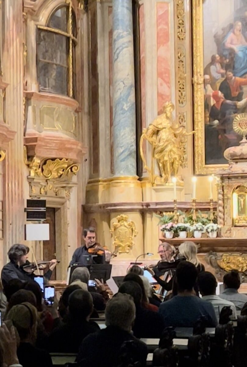 A string quartet performs inside St Anne's church in Vienna Austria