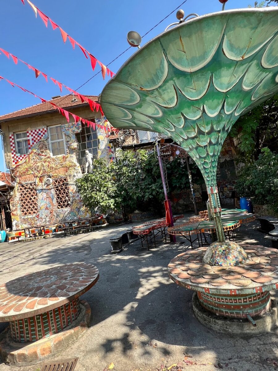 An empty outdoor cafe in Metelkova