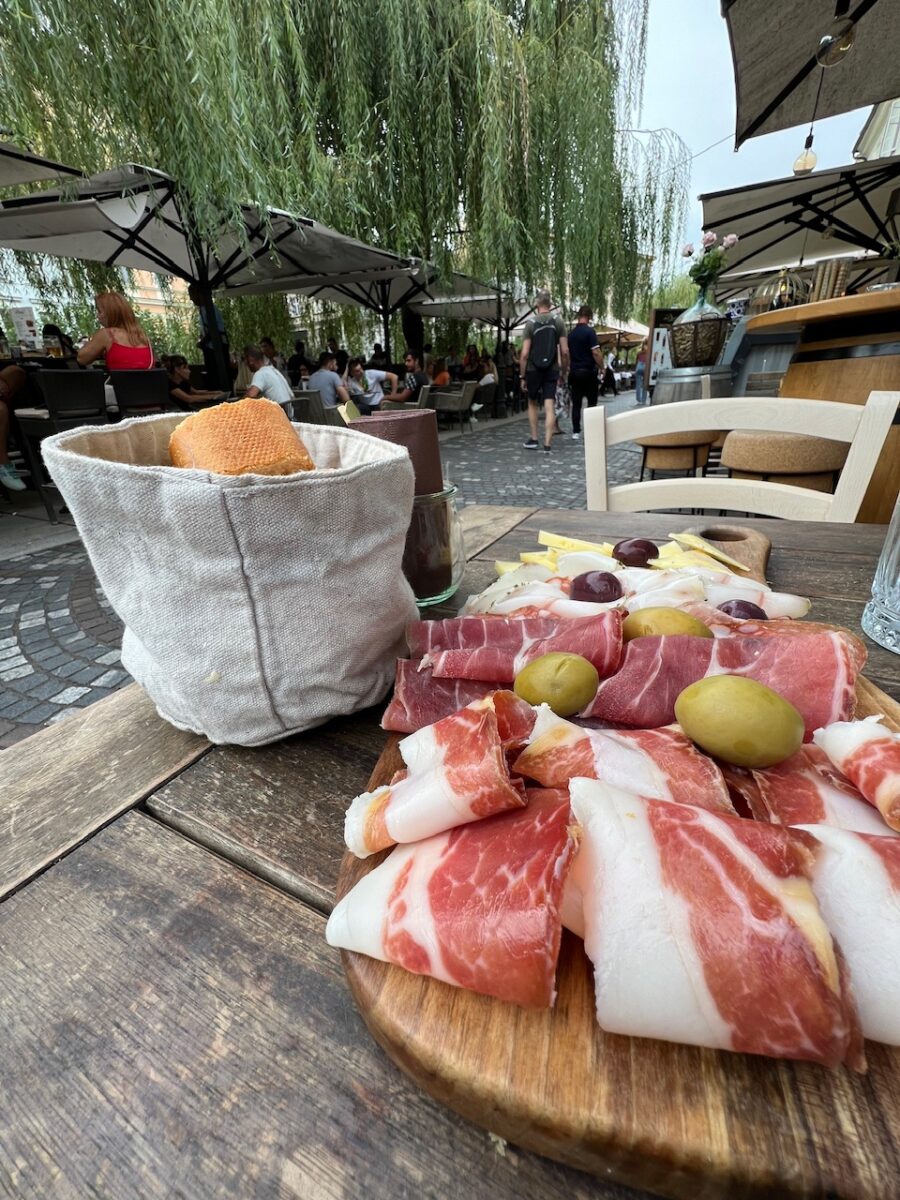 A charcuterie board from Ala Pršuterija - a wine bar in Ljubljana next to the Ljubljanica River
