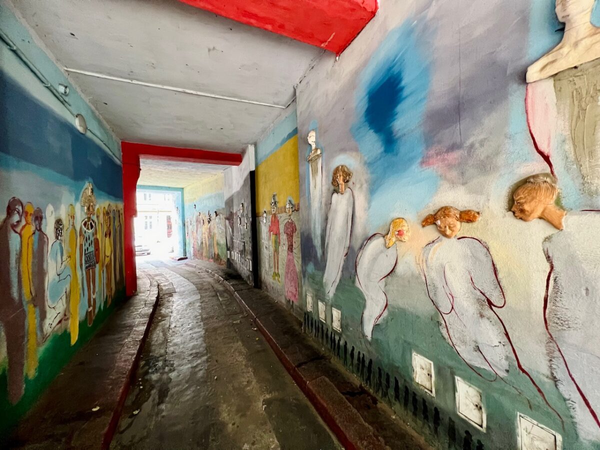 An alleyway in the Nadodrze district of Wroclaw Poland covered in street art
