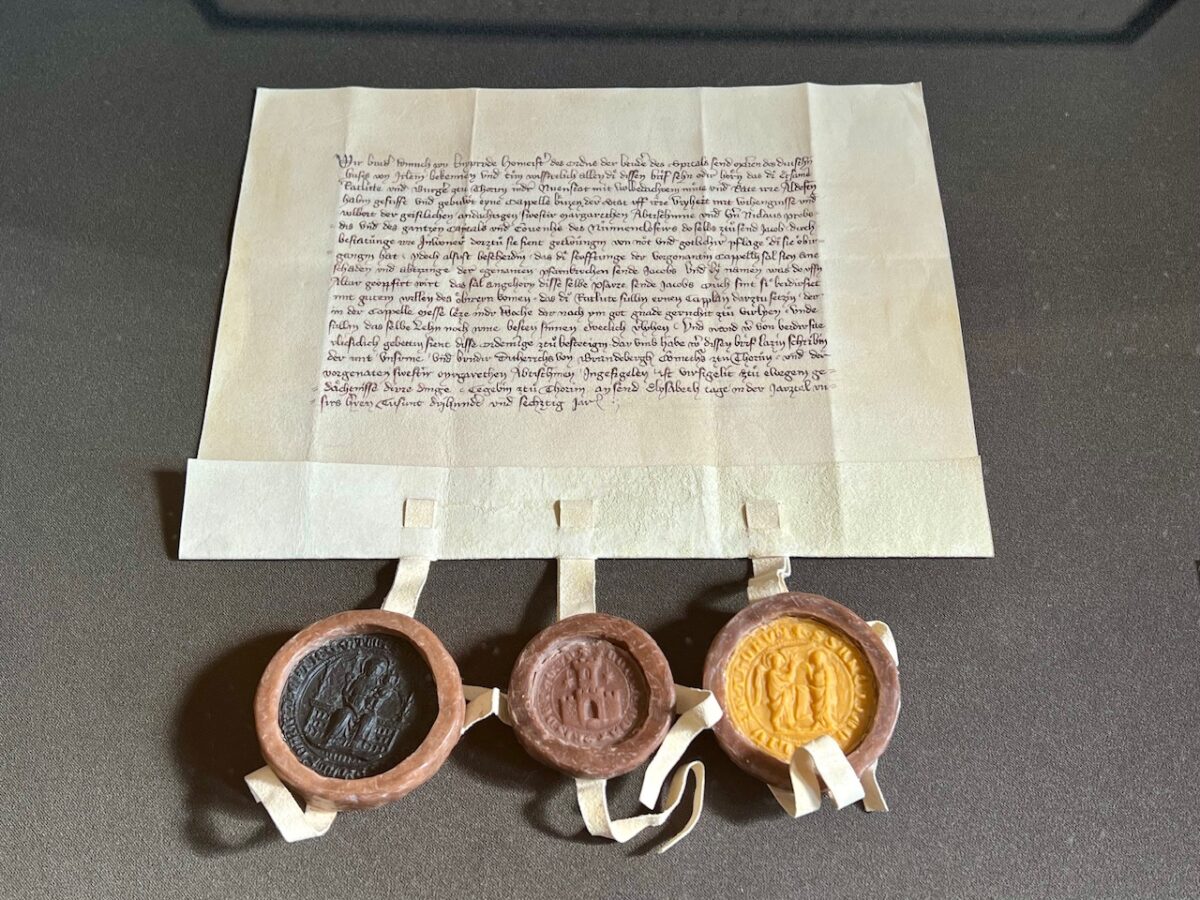 A medieval document with wax seals as used by the Teutonic Knights on display at Malbork Castle in Poland