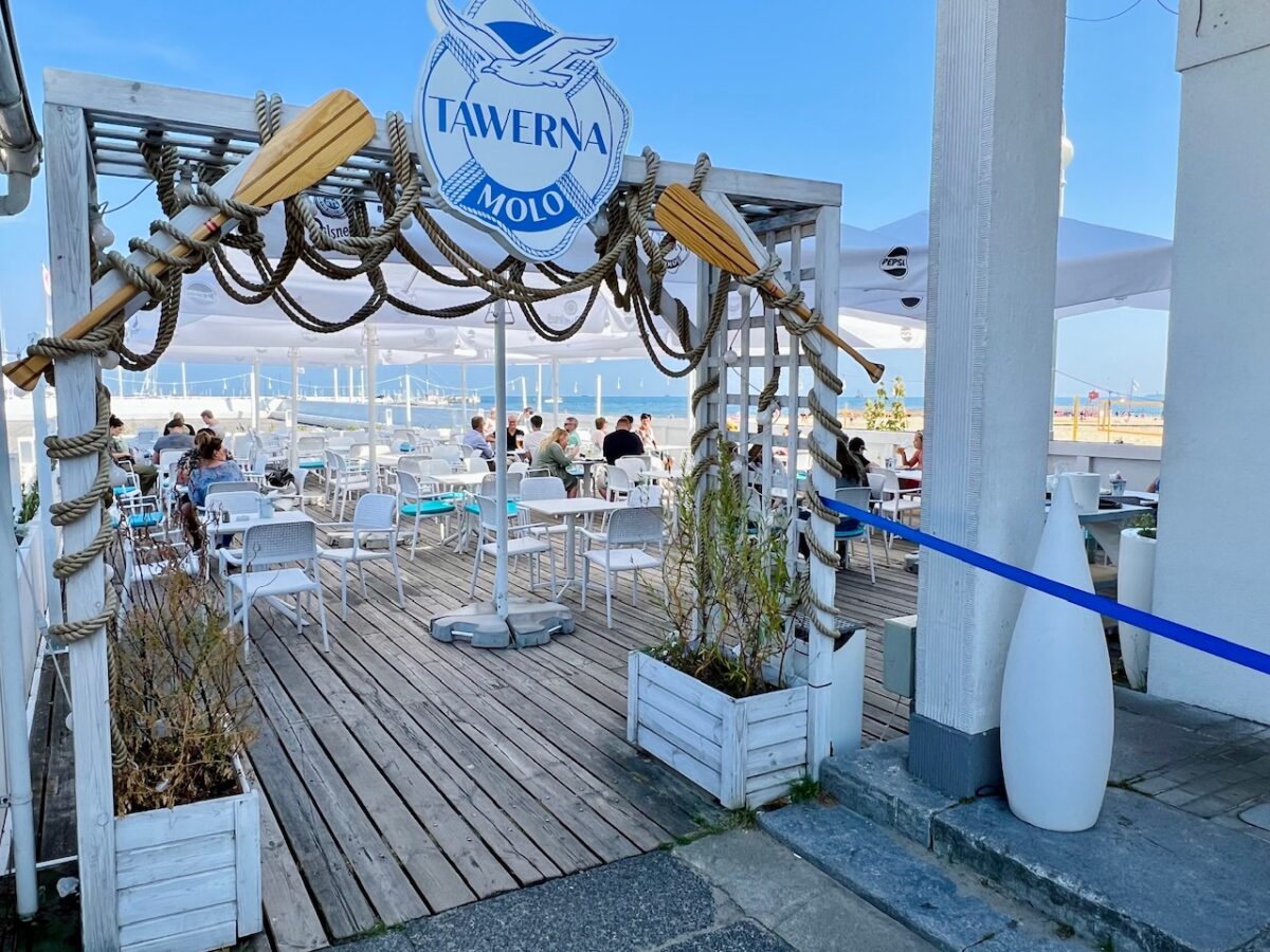 Outdoor dining at Taverna Molo next to the Sopot Pier in Poland