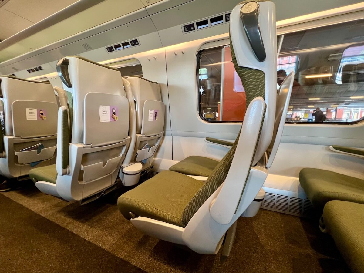 A close up look at the second class seats on a Polish EIP Pendolino high speed train while traveling from Krakow to Warsaw