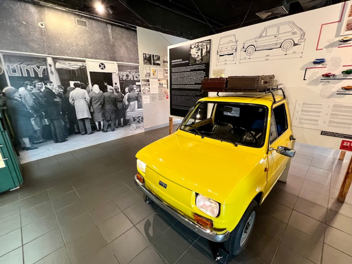A car display at the Life Under Communism Museum - one of the top museums to see when visiting Warsaw Poland