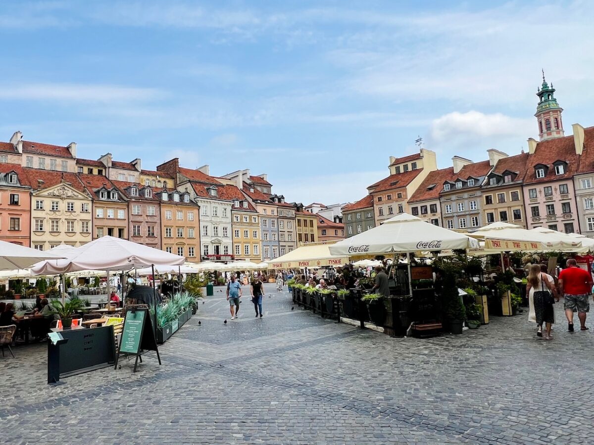 The Old Town Market Place - the main central square in Old Town Warsaw Poland filled with restaurant tables