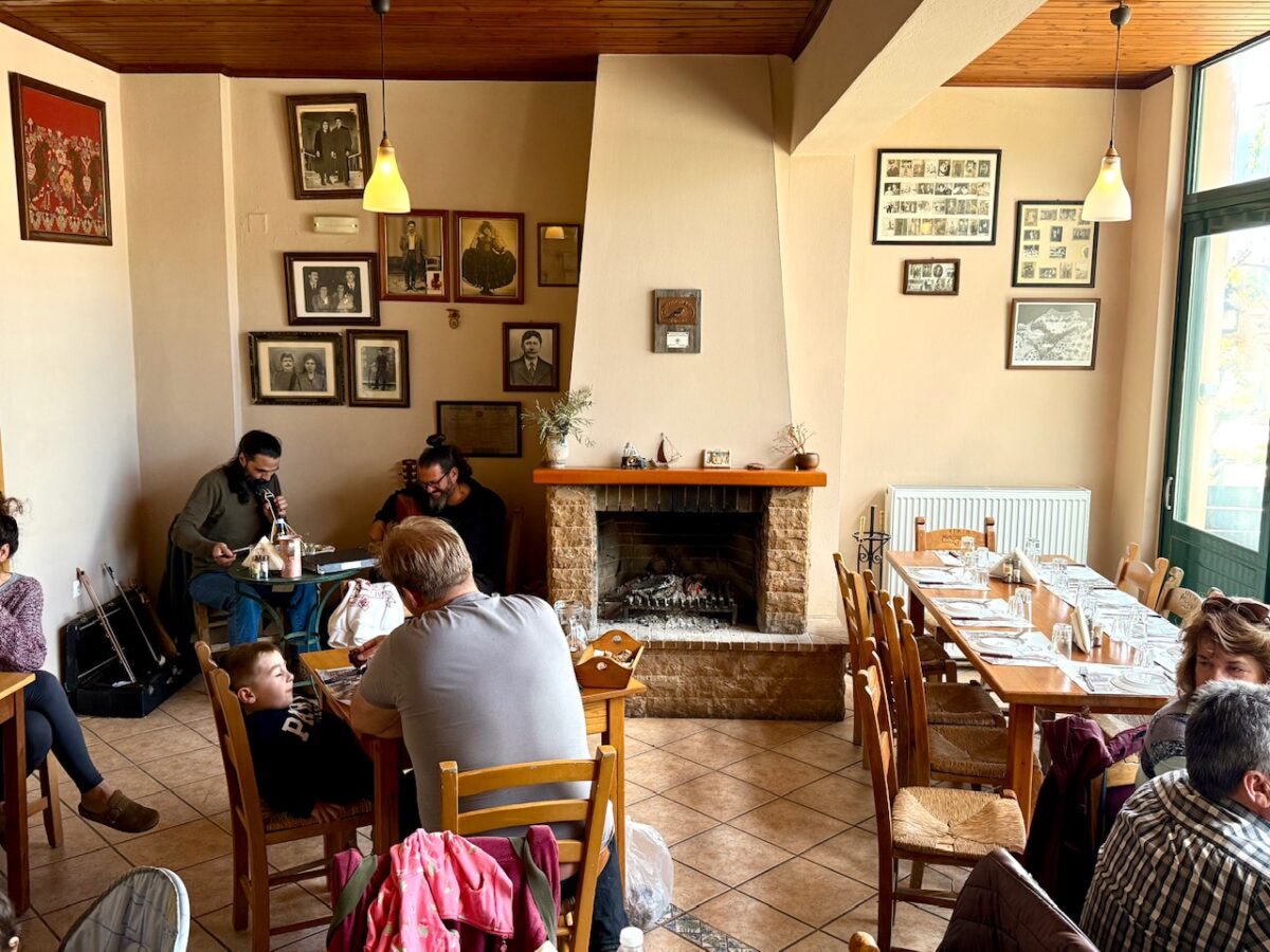 The interior dining area with musicians in the corner at Ntounias in Crete