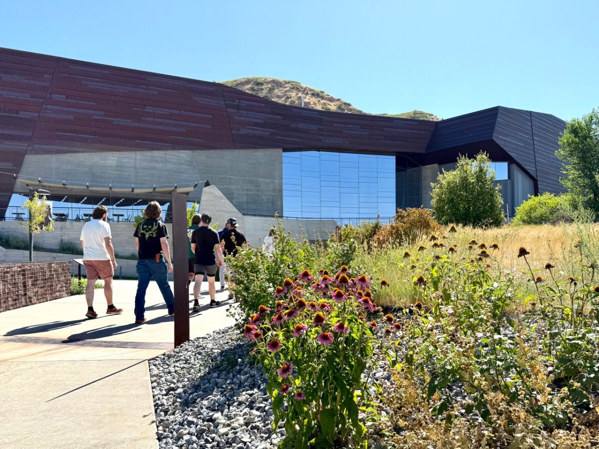 Visitors approaching the Natural History Museum of Utah 