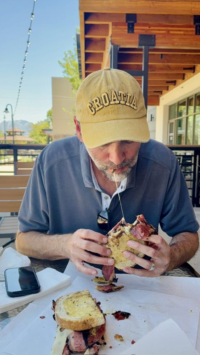 The Thorough Tripper eating The Rico sandwich at Enrico's Deli on his quest to find the best sandwich in Salt Lake City