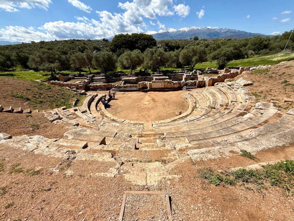 Looking down at the amphitheater at Ancient Aptera with the White Mountains in the background
